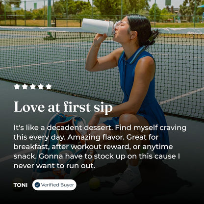 Person drinking from a water bottle on a tennis court with product review text overlay.
