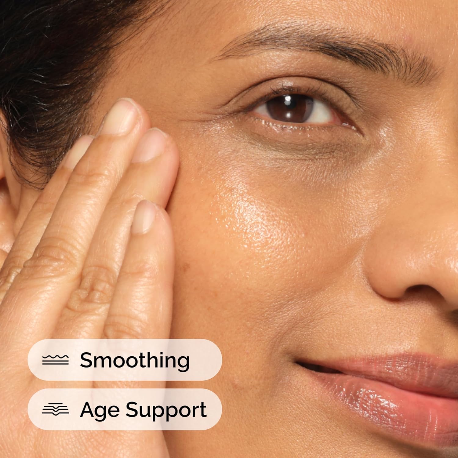 Close-up of a woman's face with text indicating smoothing and age support benefits.