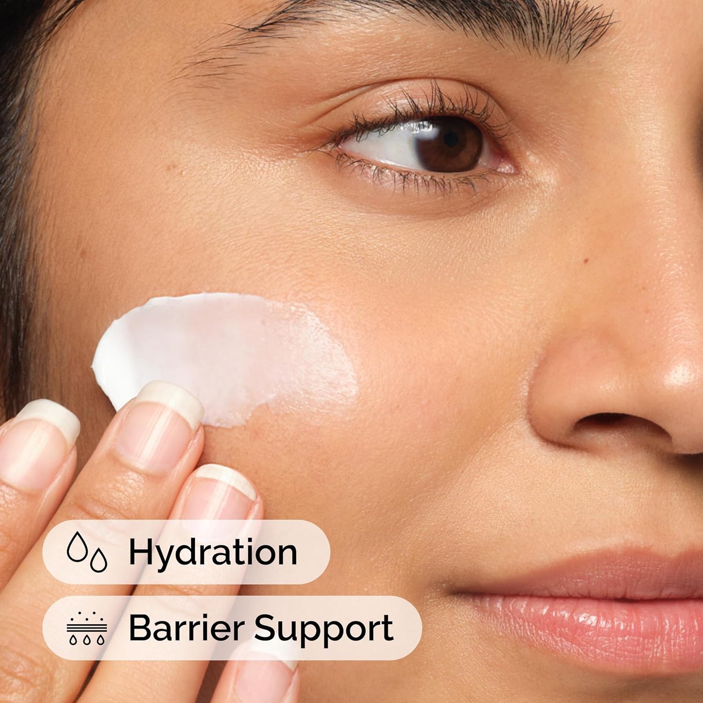 Person applying cream to their face with 'Hydration' and 'Barrier Support' text overlay.