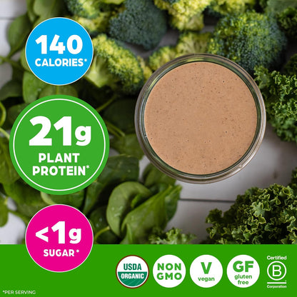 Jar of plant-based spread with nutritional information and health benefits on a green leafy vegetable background