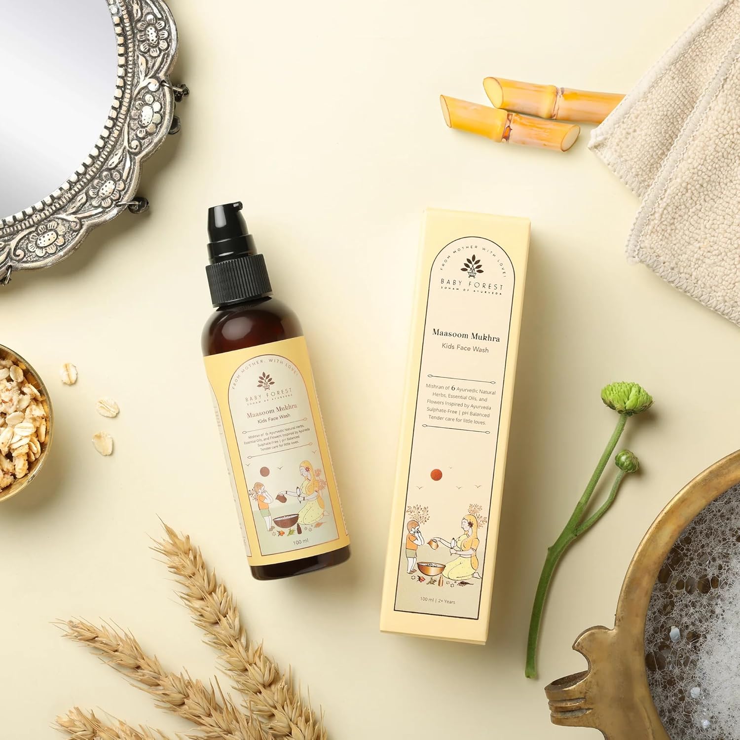 Skincare product bottle and packaging on a neutral background with decorative elements