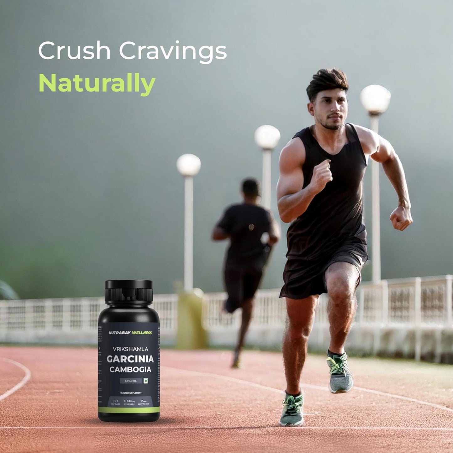 Person running on a track with a bottle of Virisham Garcinia Cambogia supplement in the foreground.