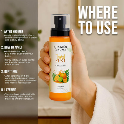 Hand holding a bottle of Arabian Aroma Tropical Mist with usage instructions on a blurred background