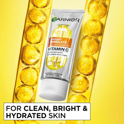 Garnier Bright Complete serum cleanser with lemon slices on a yellow background