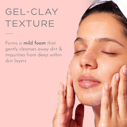 Woman applying a gel-clay texture product to her face with text on a pink background