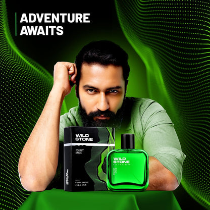 Man holding Wild Stone perfume bottle and packaging against a green background with 'Adventure Awaits' text.