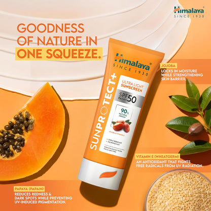 Himalaya Sunprotect+ sunscreen tube with papaya and leaves on an orange background
