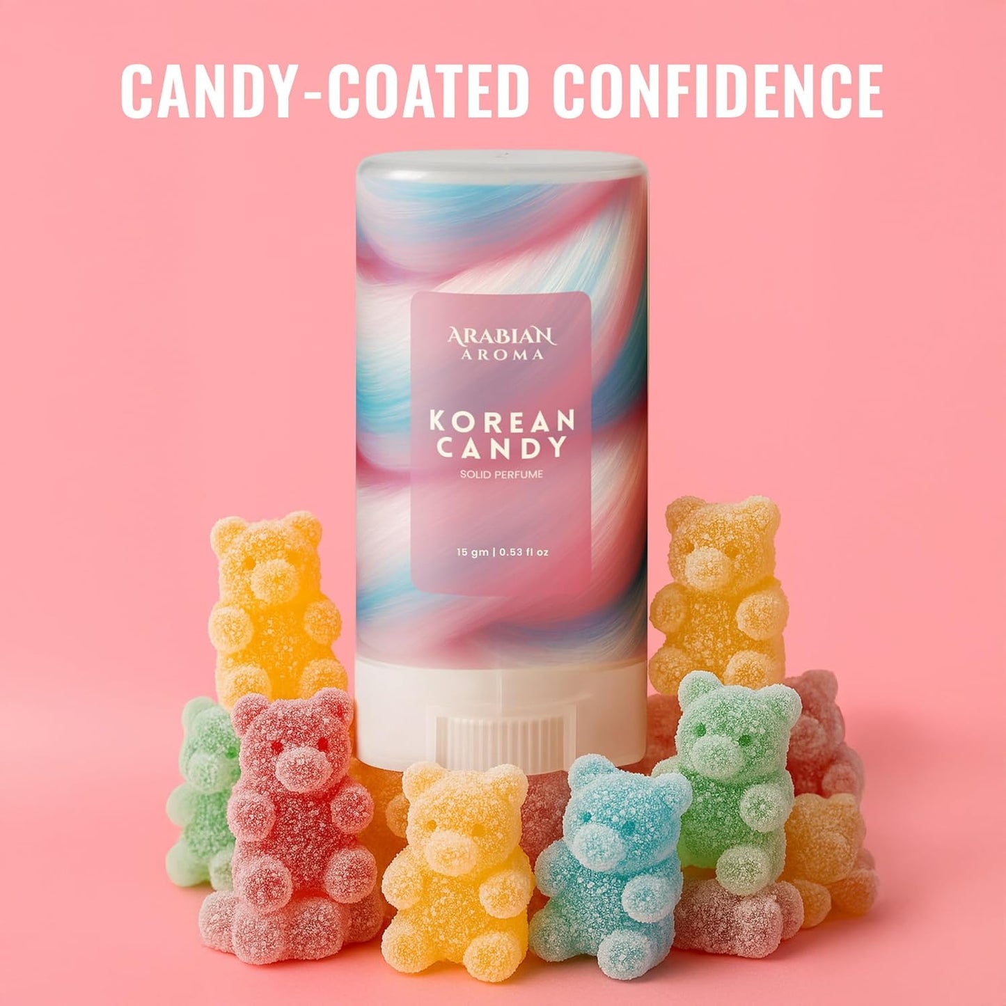 Korean candy-themed perfume bottle with colorful gummy bear toys on a pink background