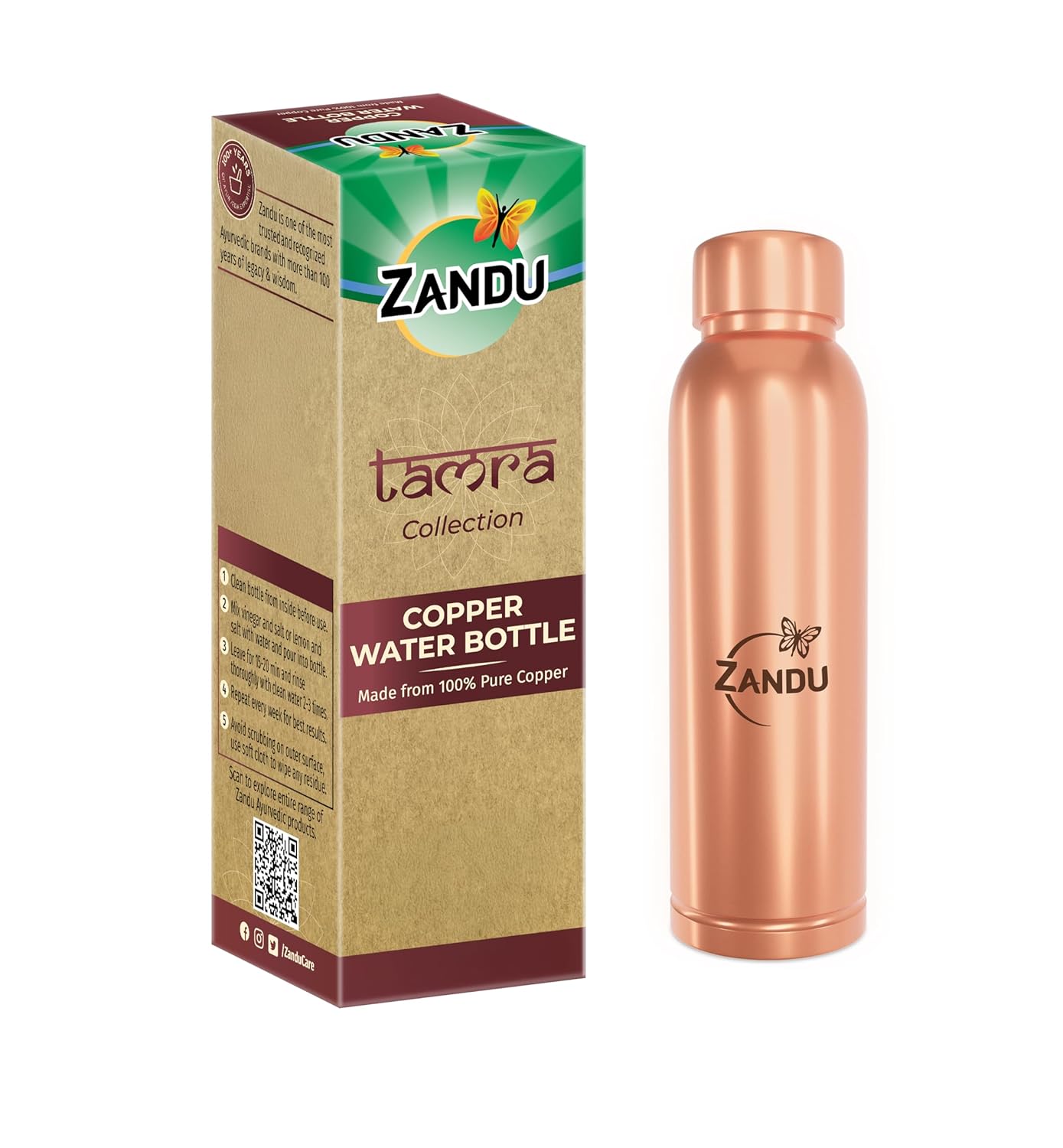 Copper water bottle with Zandu branding next to its packaging on a white background
