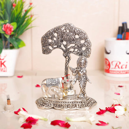 KridayKraft Silver Plated Kamdhenu Cow with Krishna Standing Under Tree Plying Flute Metal Statue,Krishna Murti Idol for Pooja & Decor Your Home,Office,Showpiece