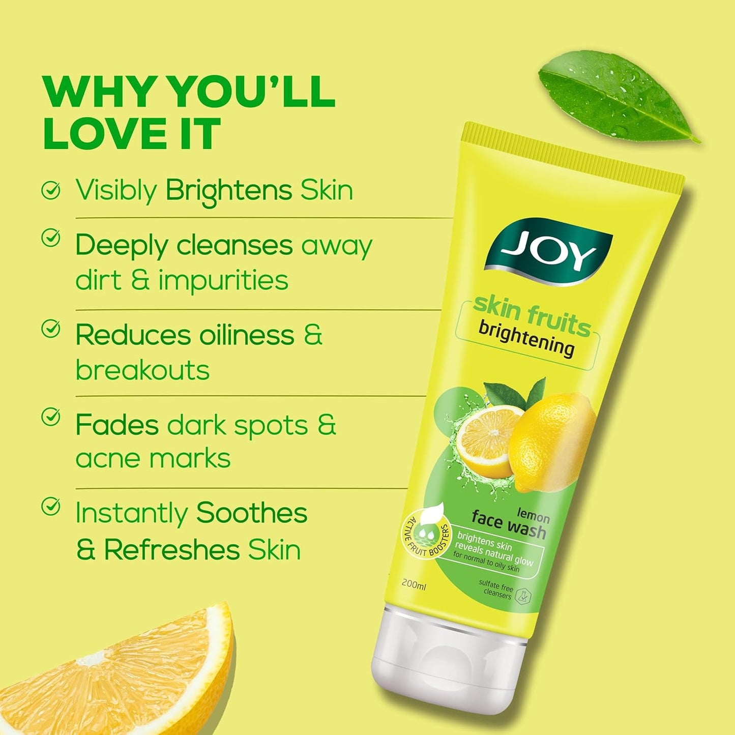 JOY skin fruits brightening lemon face wash on a yellow background with lemon slices and a leaf.