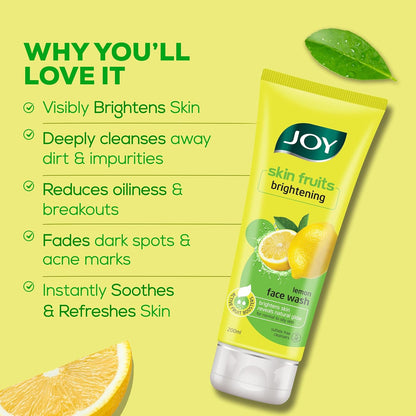 JOY skin fruits brightening lemon face wash on a yellow background with lemon slices and a leaf.