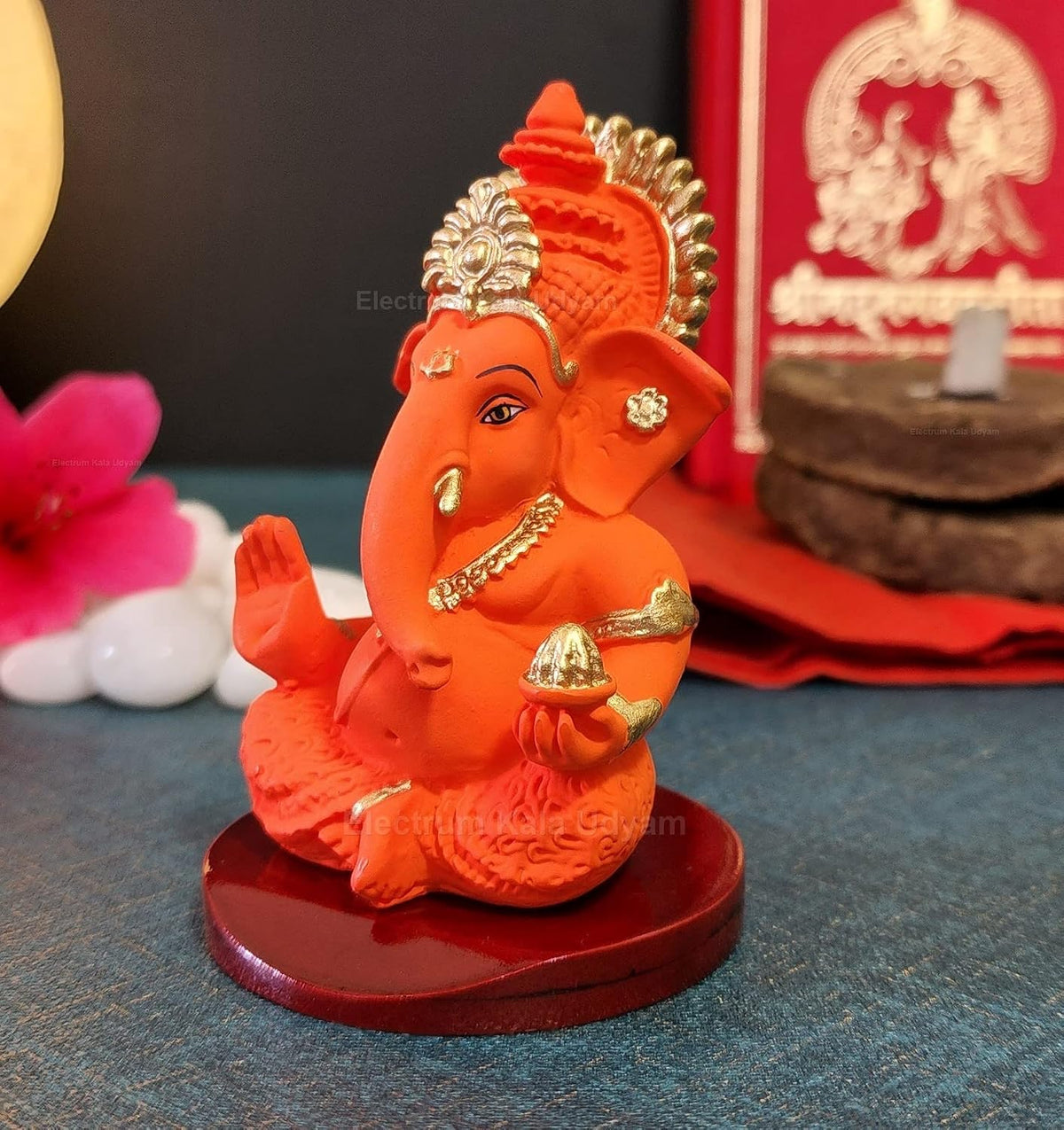 Handcrafted Poly Resin Ganesha Statue with Base - Perfect for Car Dashboard, Office Desk, Shelves, and Home Decor - Ideal Housewarming Gift! (OrangeMukutwithbase)