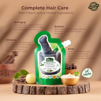 Herbal hair care product with ingredients listed on a wooden platform