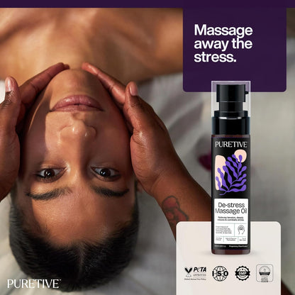 Person receiving a massage with Puretive de-stress massage oil displayed.
