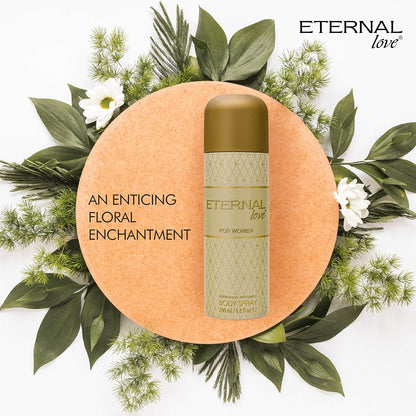 Body spray bottle labeled 'Eternal Love' surrounded by green leaves and flowers on a white background.