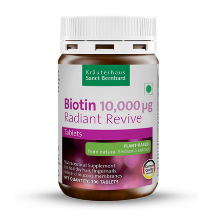 Bottle of Biotin 10,000 µg Radiant Revive supplement by Kräuterhaus Sanct Bernhard on a white background
