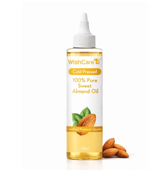 Bottle of WishCare 100% Pure Sweet Almond Oil with almonds on a white background