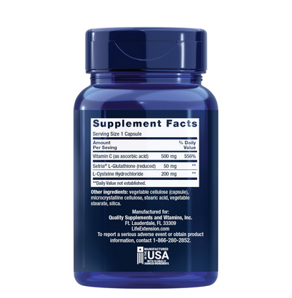 Blue supplement bottle with label on a white background