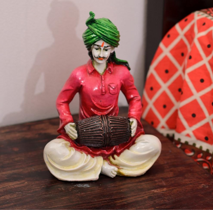 Rajasthani Lady Playing Dholak Showpiece Polyresin Statue (12.5 cm x 10 cm x 15 cm, Green and Orange)