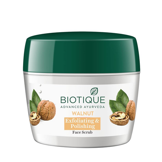 Biotique Walnut Exfoliating & Polishing Face Scrub jar with green lid on a white background