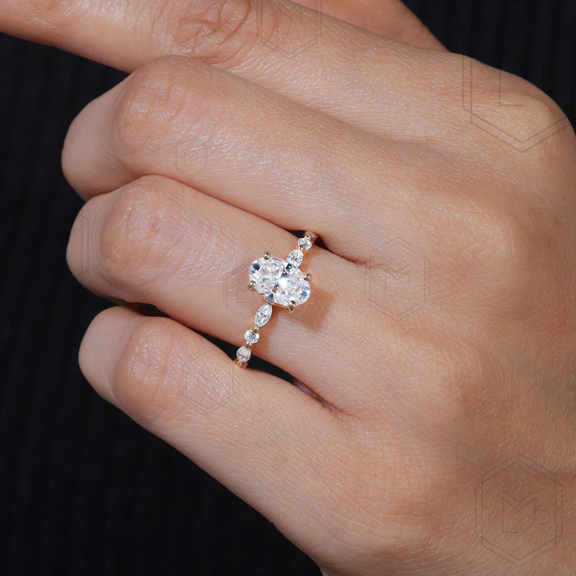 Close-up of a hand wearing a diamond ring with a dark background
