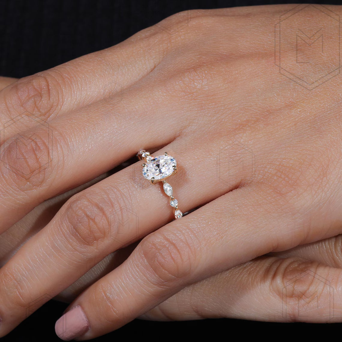 Close-up of a hand wearing a rose gold diamond ring with a dark background