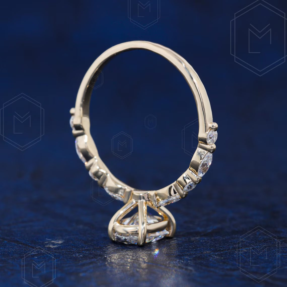 Gold ring with diamonds on a blue background