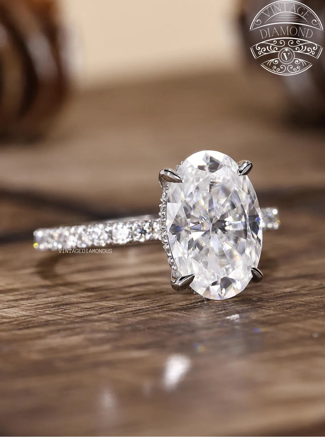 Diamond ring on a wooden surface with a blurred background