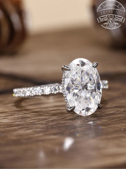Diamond ring on a wooden surface with a blurred background