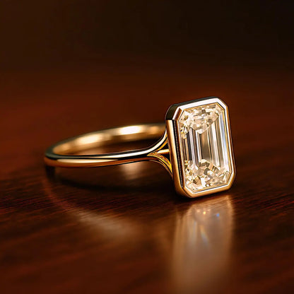 Gold ring with a large diamond on a reflective surface
